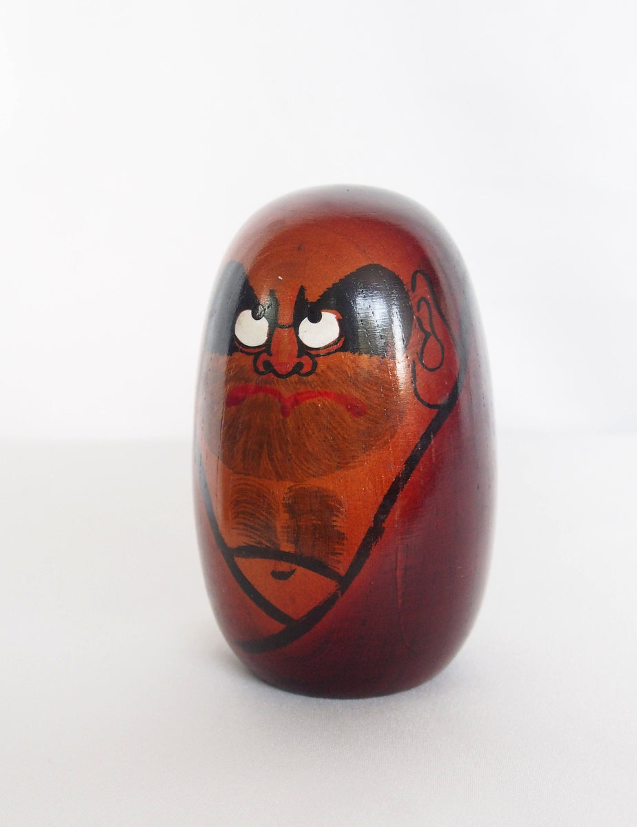 wooden daruma doll