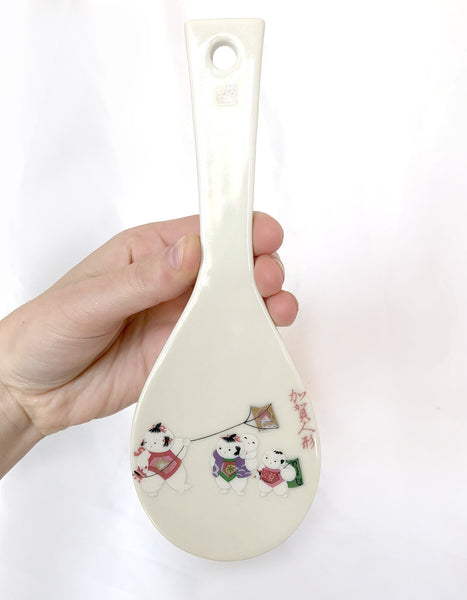 Decorative Japanese rice paddle - ceramic with an image of playful children