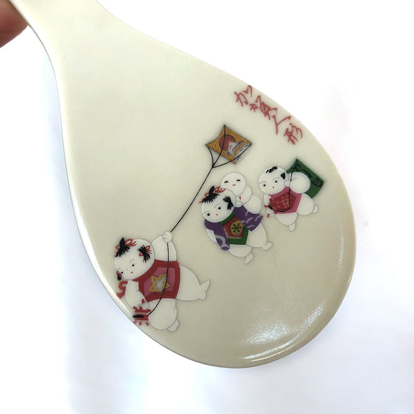 Decorative Japanese rice paddle - ceramic with an image of playful children