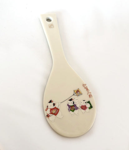 Decorative Japanese rice paddle - ceramic with an image of playful children